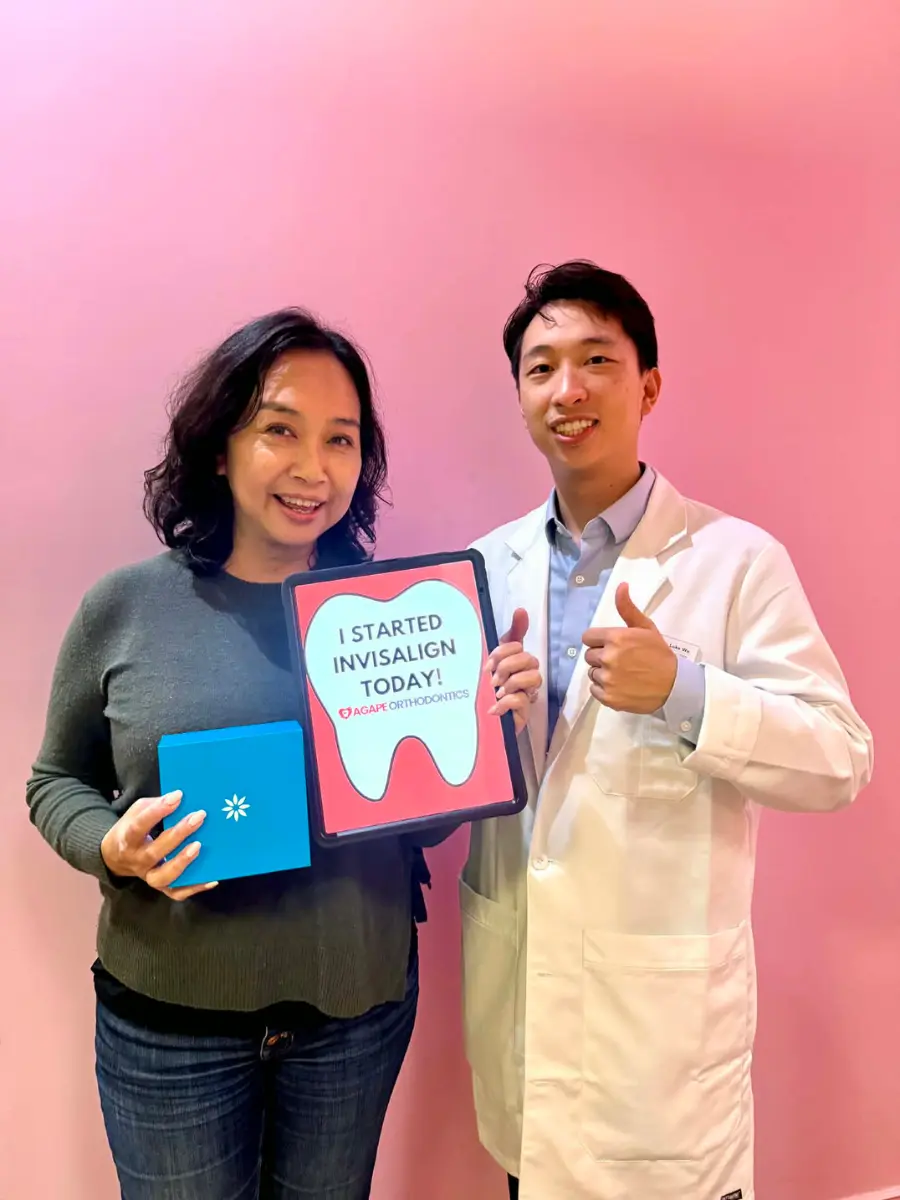 Dr. Luke Wu with a patient
