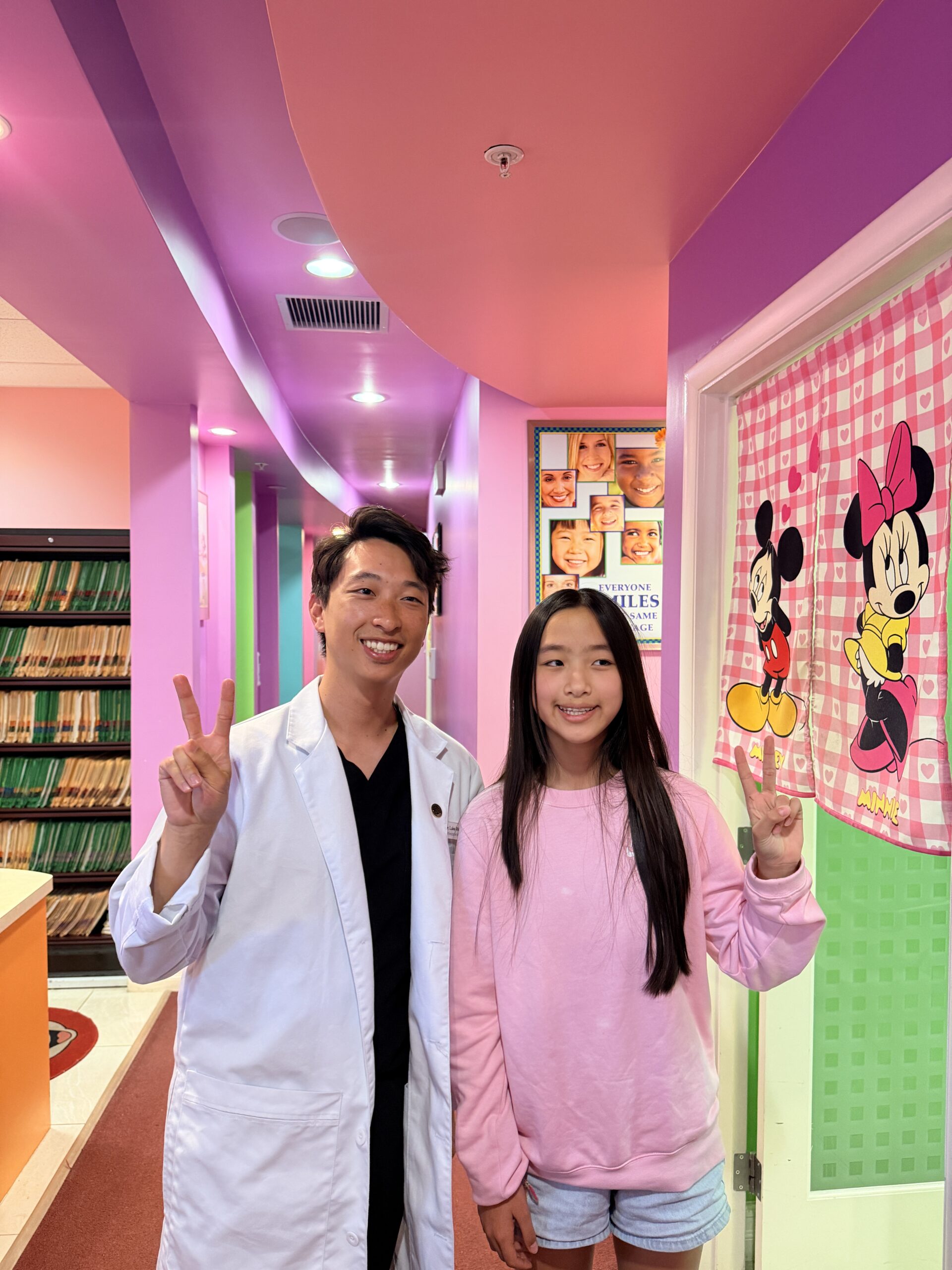 Dr. Luke Wu with a patient